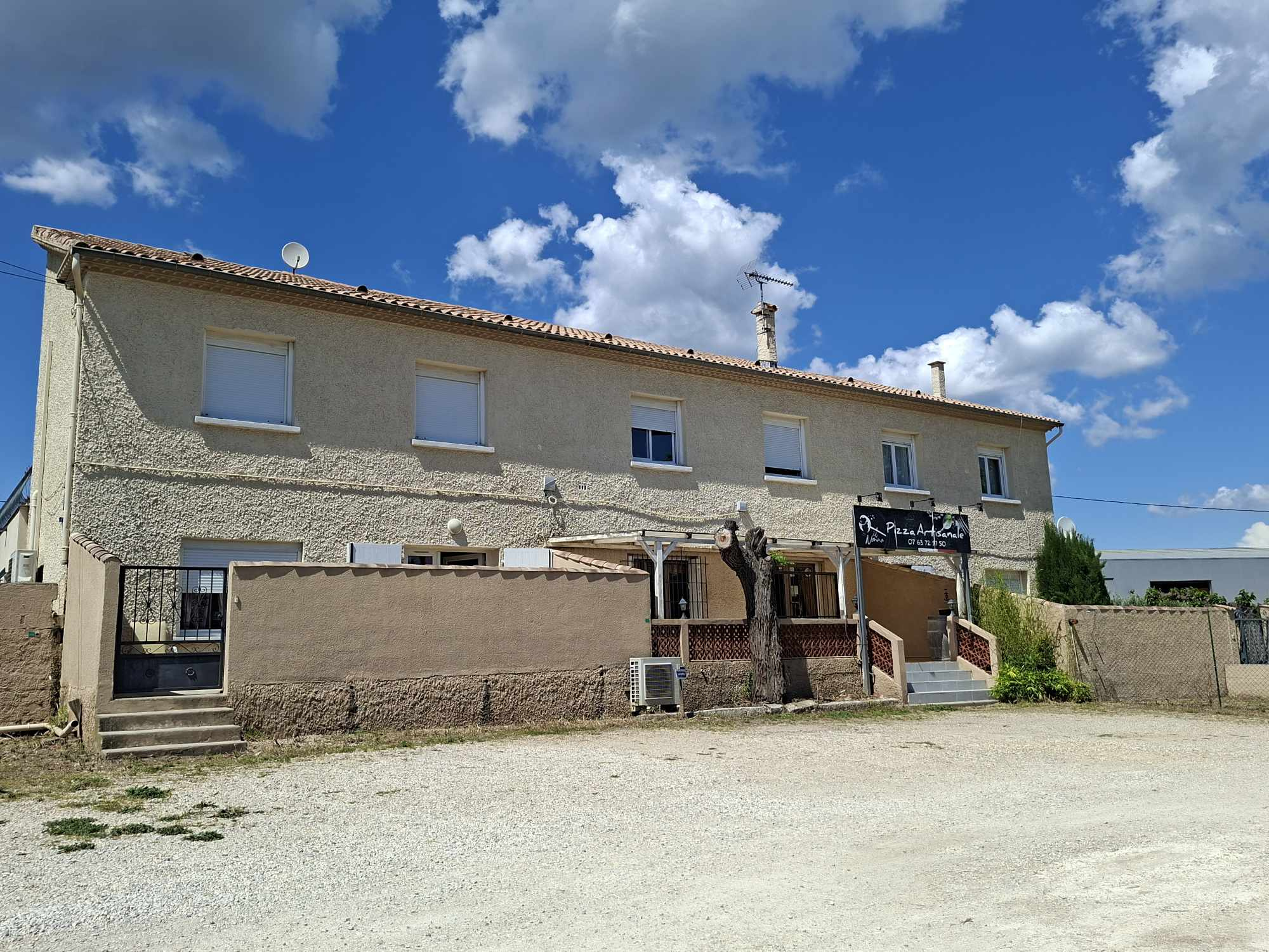 Immeuble en monopropriété BEZOUCE 6 logements + 1 commerce 1